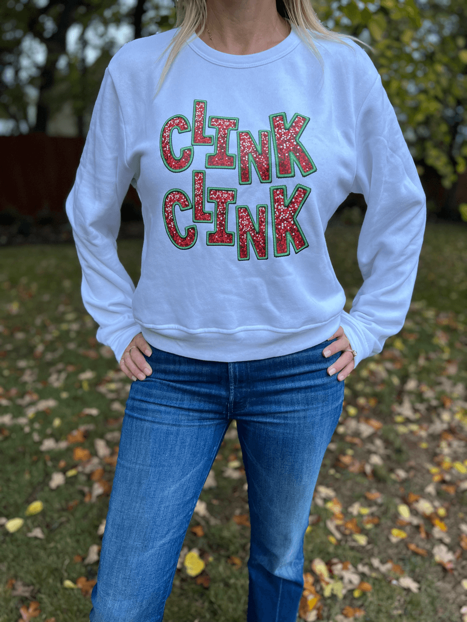 Housewives of True Crime Clink Clink Holiday Crew Neck Sweatshirt in red and green glitter